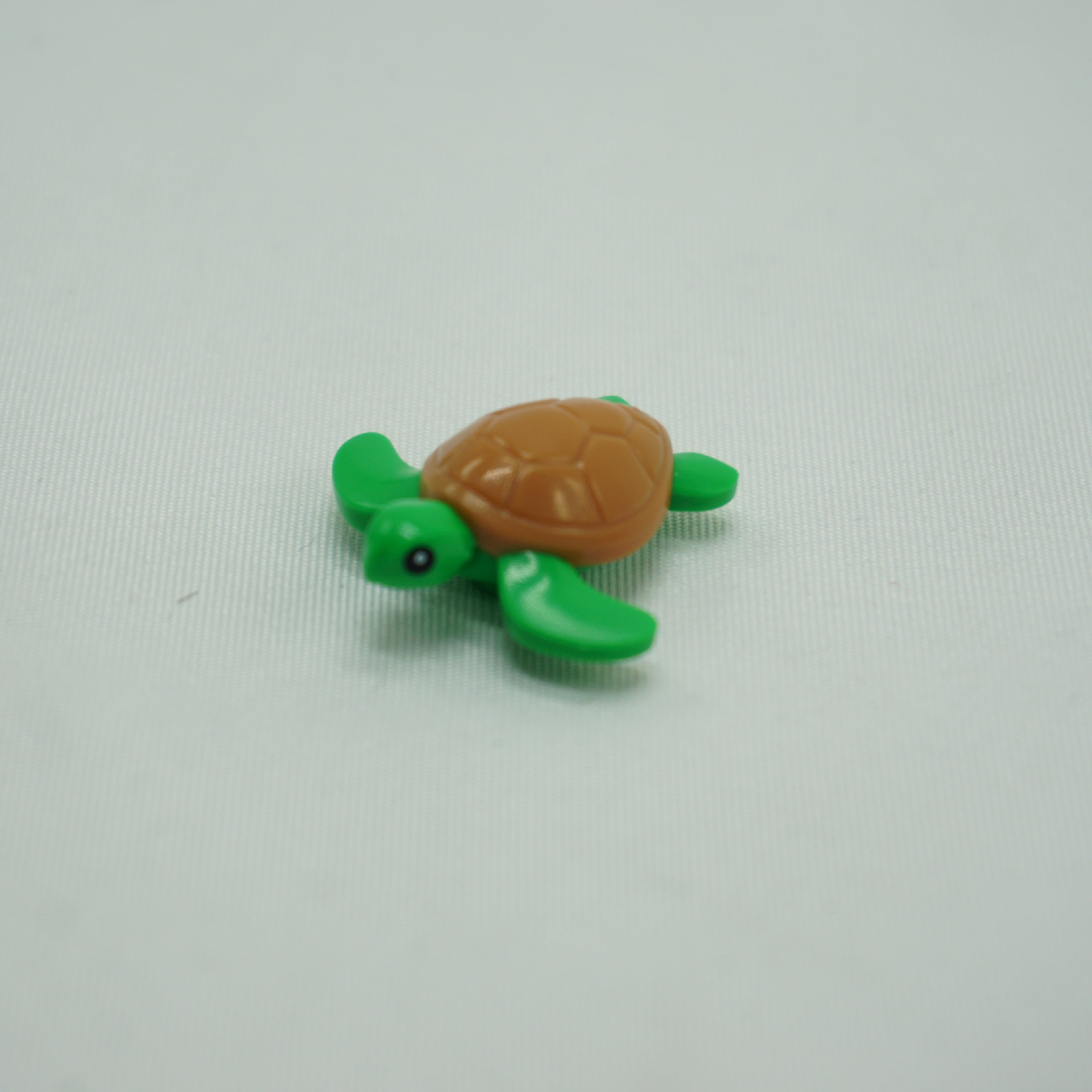 Part 102285pb01 - Sea Turtle with Molded Medium Nougat Shell and Printed Black Eyes with White Pupils Pattern