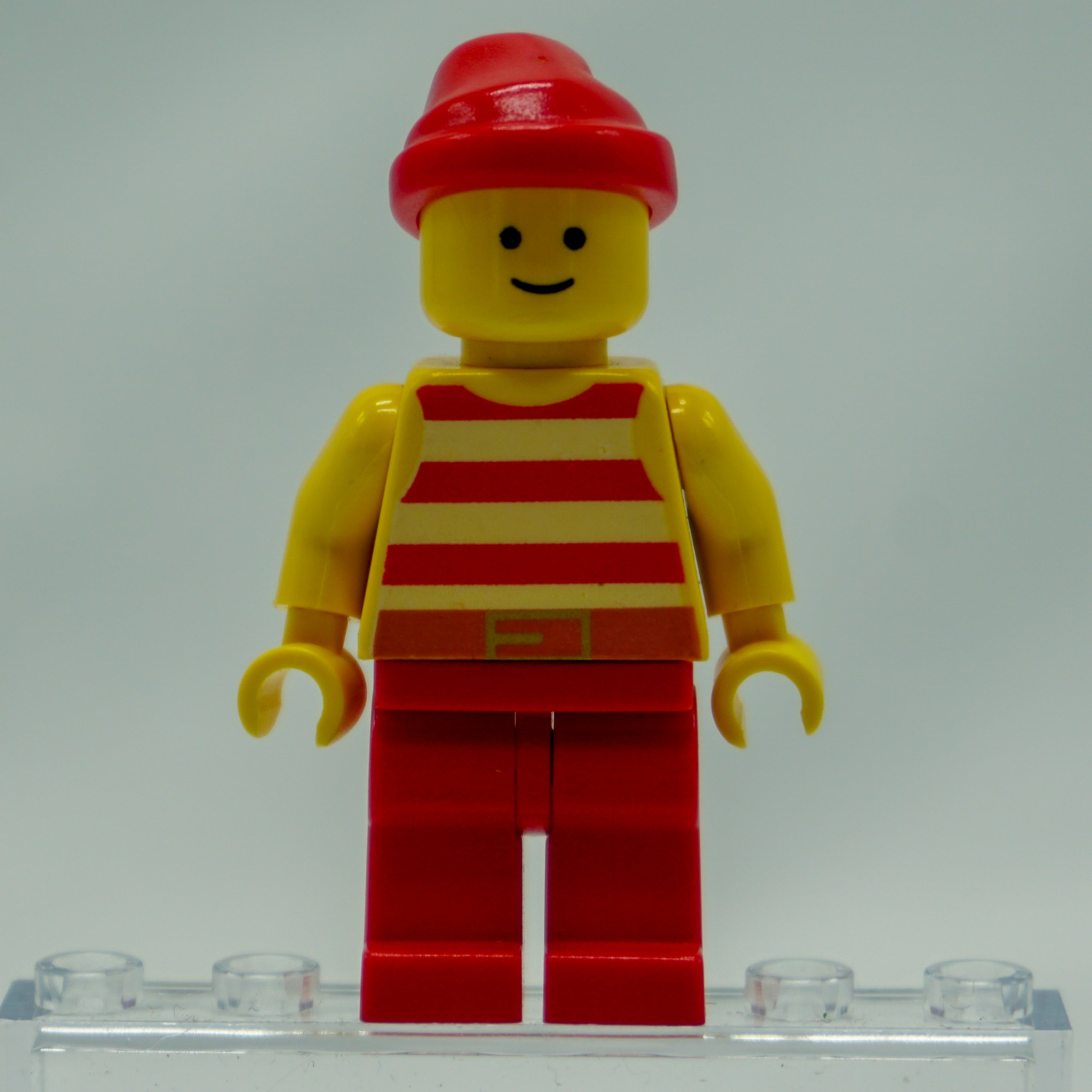 Minifig pi046 - Pirate Red / White Stripes Shirt, Red Legs, Red Bandana